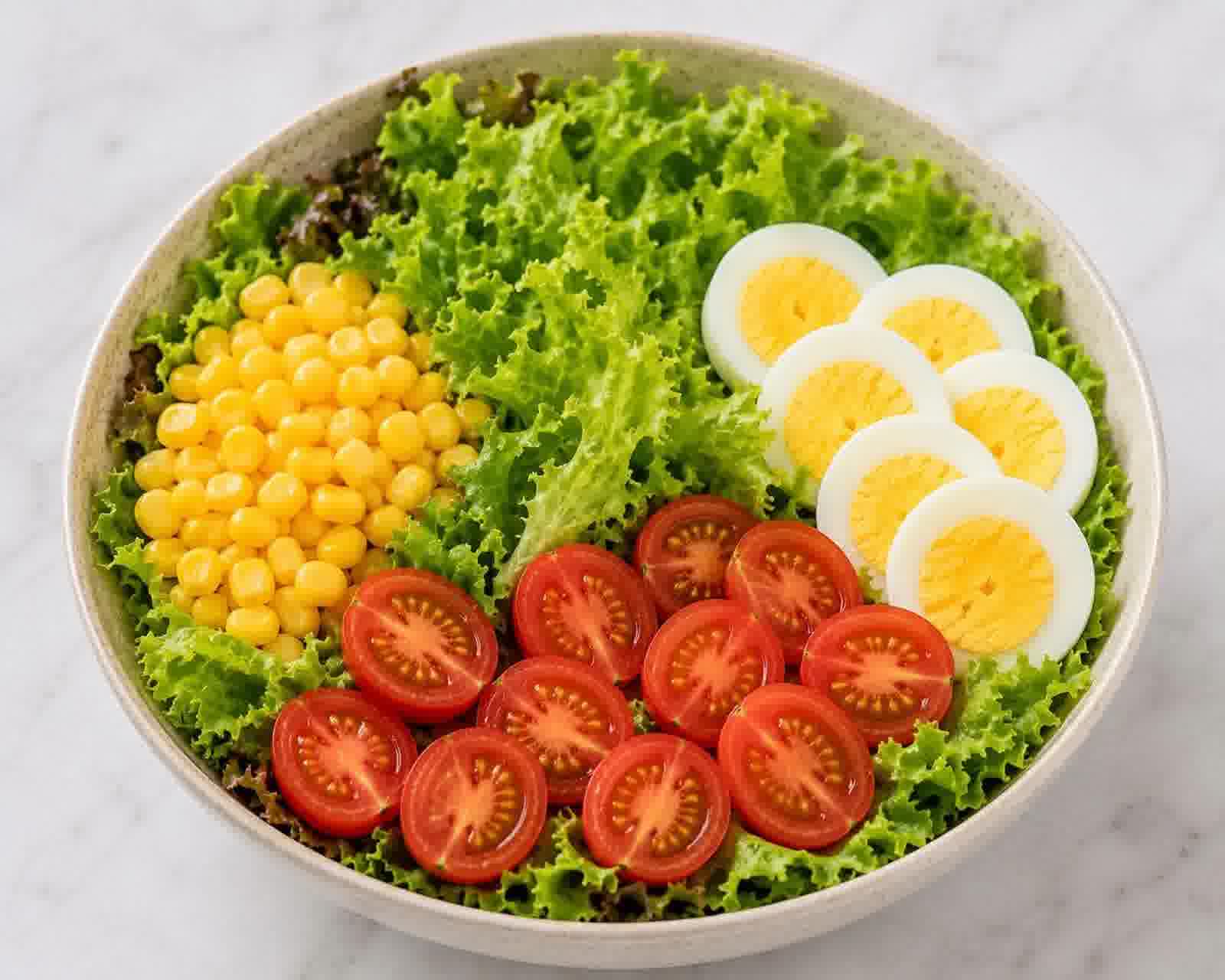 A fresh Rolls & Bowl chef salad bowl